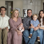 family mom dad three children and newborn baby girl lifestyle photograph