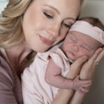 family mom and newborn baby girl lifestyle photograph