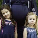 family maternity two daughters photograph
