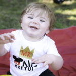 family toddler boy one year old cake smash photograph