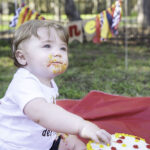 family toddler boy one year old cake smash photograph